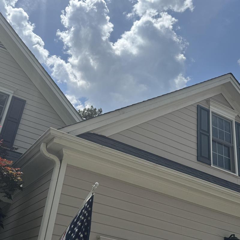 Exterior trim and siding on home gable end Exterior trim and siding on home gable end