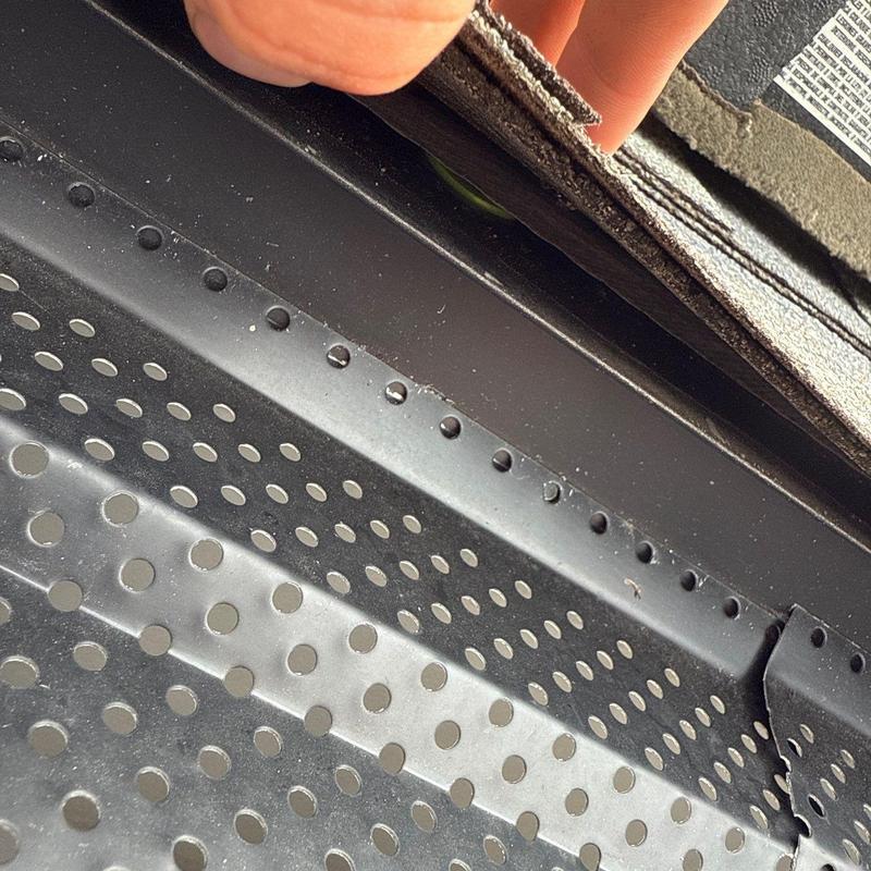Roof edge metal flashing with shingle lift and damage