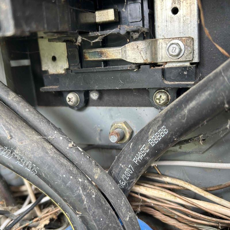 Bathroom electrical breaker and wiring close-up