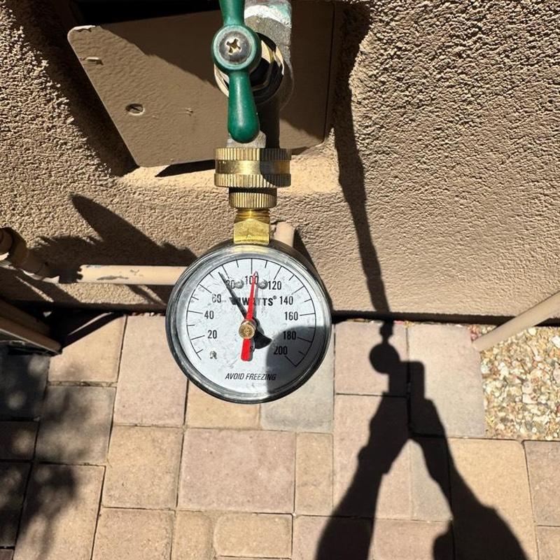 Water pressure gauge on outdoor hose bib