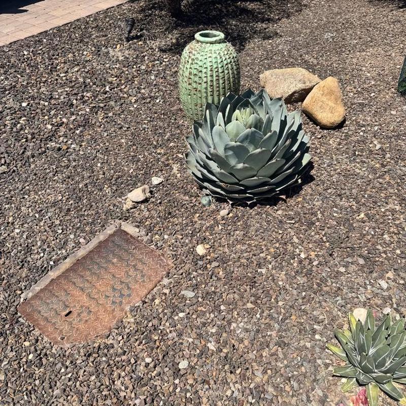 Water softener seal stack kit in gravel landscape