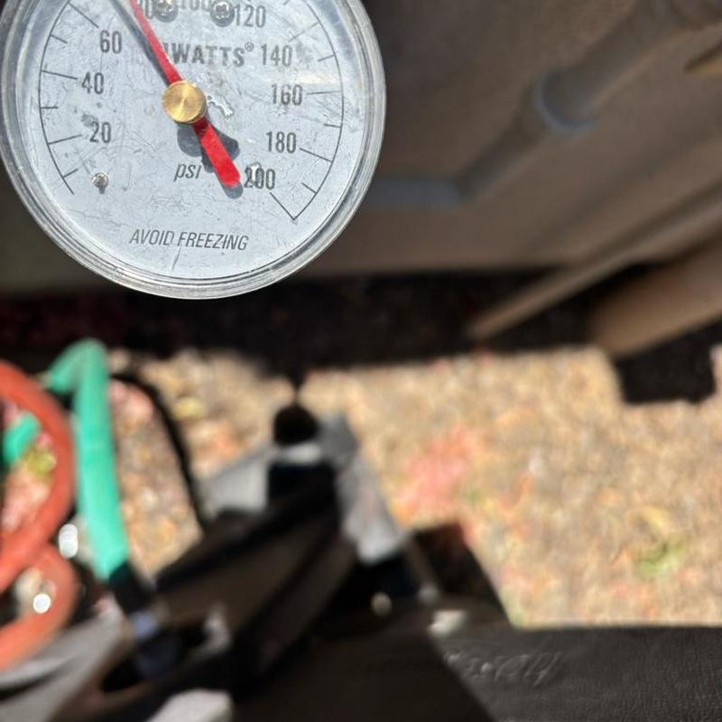 Pressure reducing valve gauge reading near curb stop box