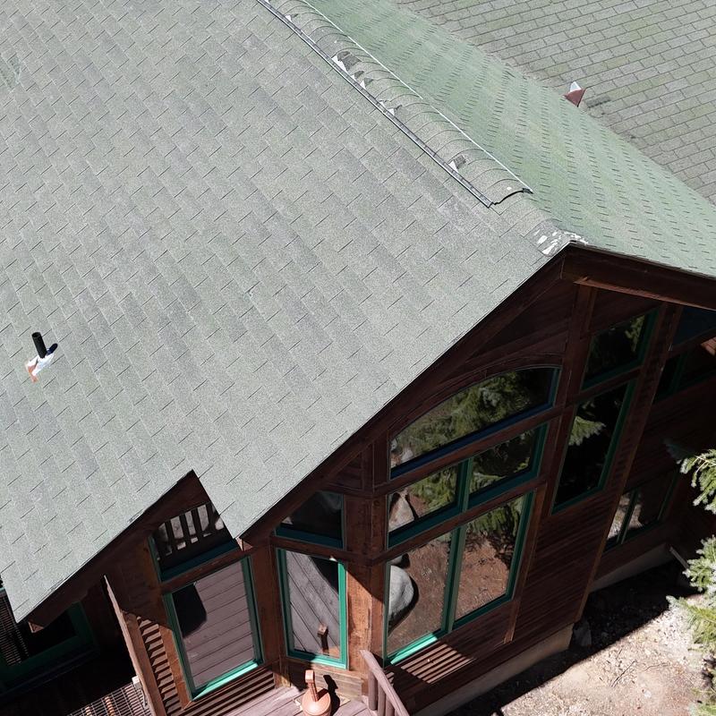 Asphalt shingle roof with heat tape and ice shield