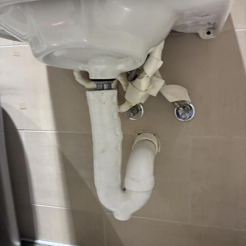 Bathroom sink drain pipe with extension tube installed