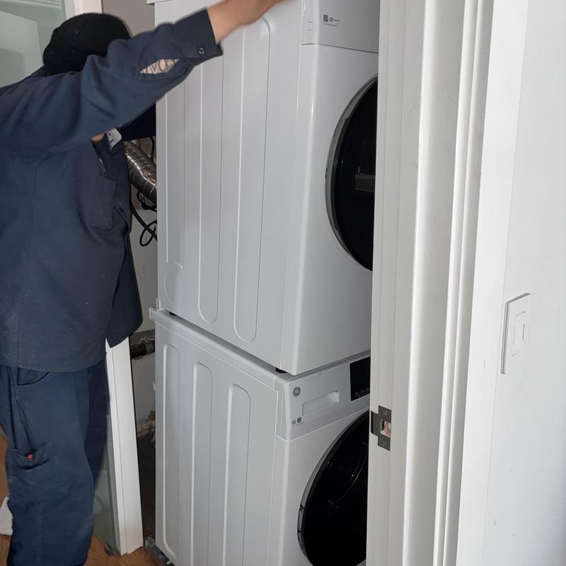 Stackable washer and dryer installation in residence Stackable washer and dryer installation in residence