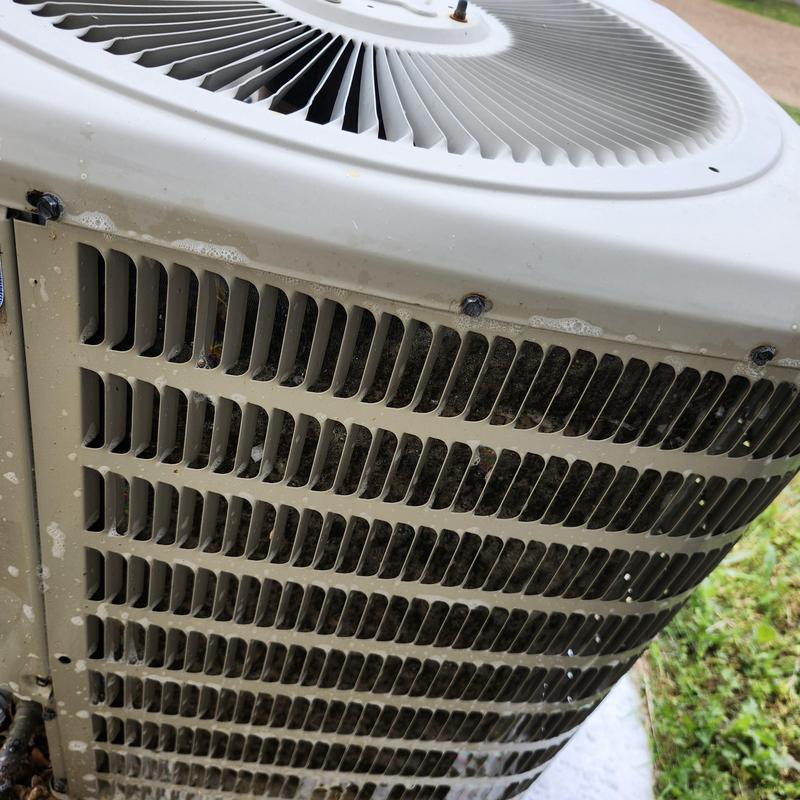 Condenser coil on split gas AC unit outdoor fan Condenser coil on split gas AC unit outdoor fan