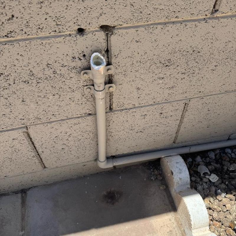 12 PVC pipe and hose bib with new fittings on wall