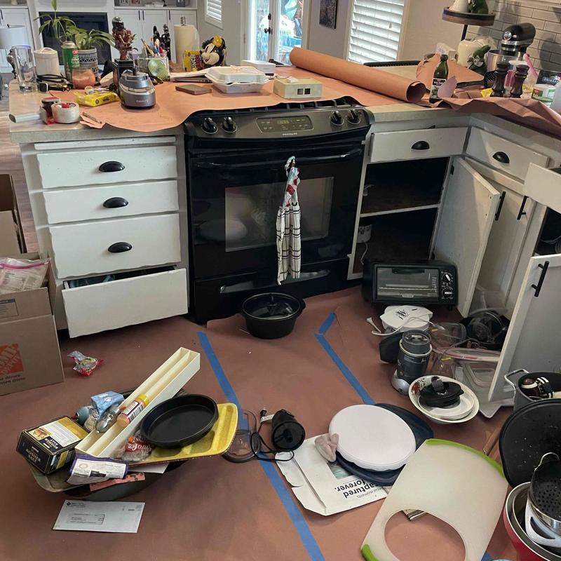 Gas range installation with floor penetration and gas line