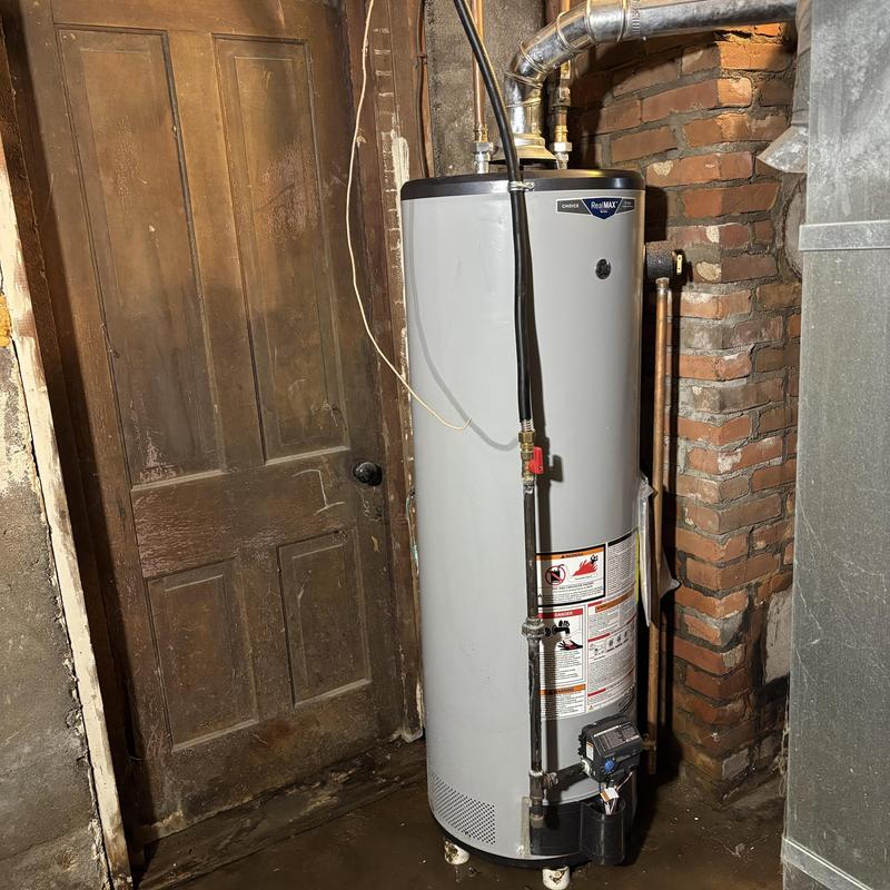 Water heater installation in flooded basement corner
