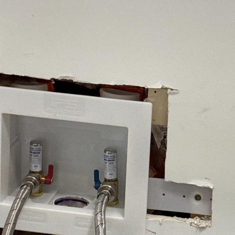 Washing machine box with new valves installed in wall