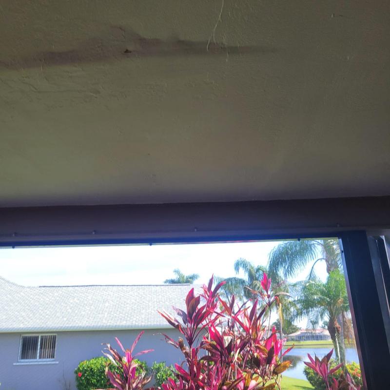 Ceiling water damage near screened enclosure door