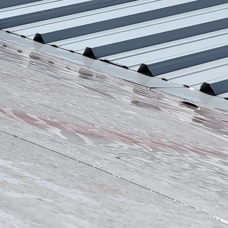 TPO roofing seams near 5V crimp metal roof transition