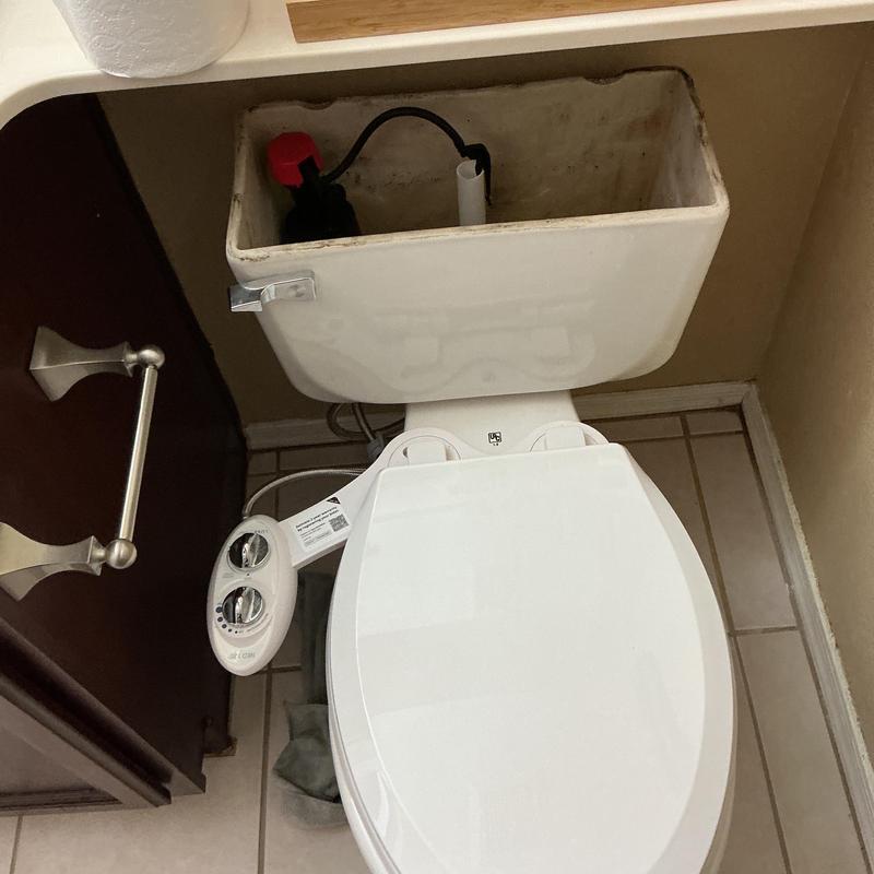 Toilet tank interior and bidet attachment controls Toilet tank interior and bidet attachment controls