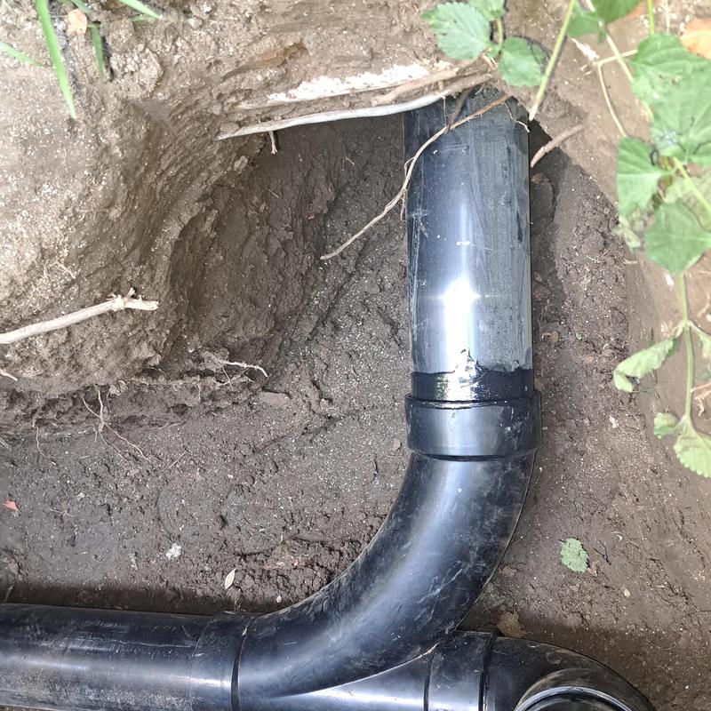 ABS drain pipe with elbow joint in soil trench