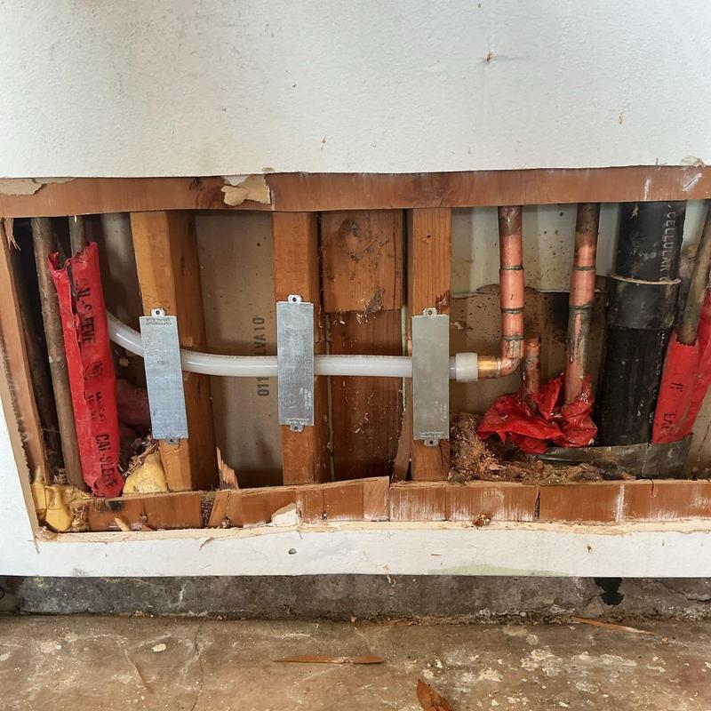 Cold water supply line reroute behind wall studs
