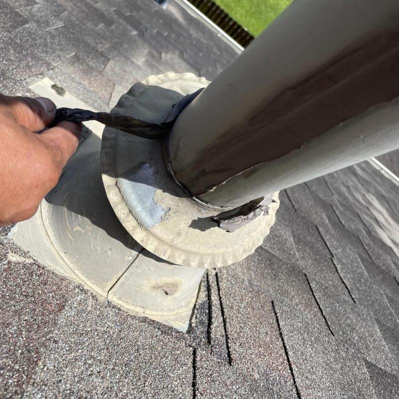 Plumbing vent flashing with deteriorated sealant removal Plumbing vent flashing with deteriorated sealant removal
