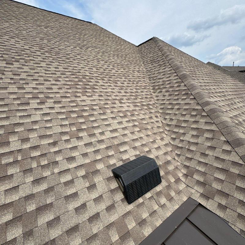 Asphalt shingle roof with vent and ridges, hail damage inspection