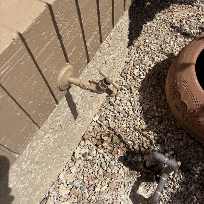 Outdoor hose bib installation on exterior wall Outdoor hose bib installation on exterior wall
