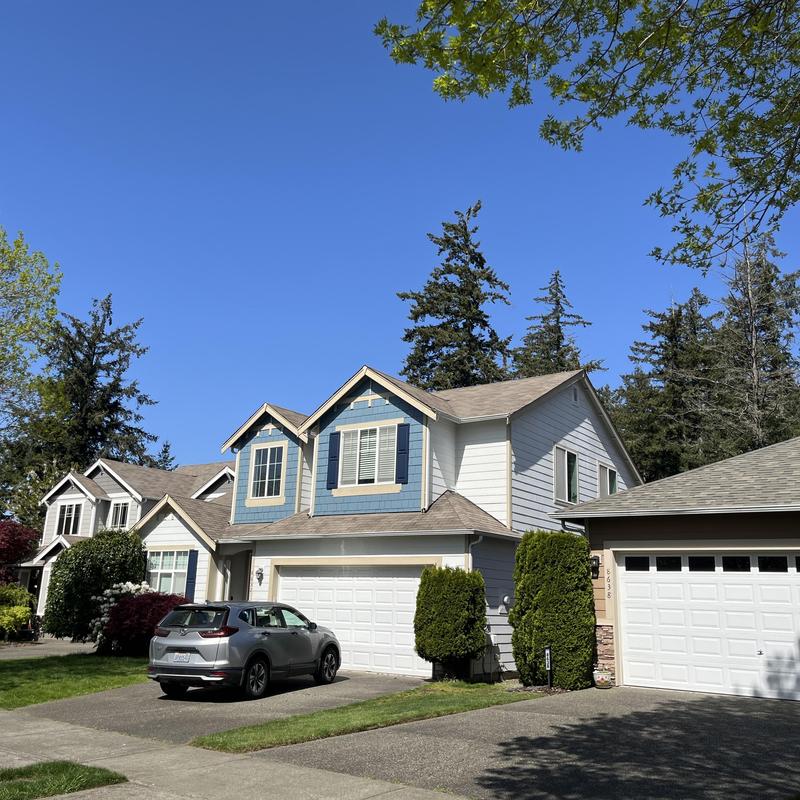 Asphalt shingle roof on suburban home in Hayden, ID