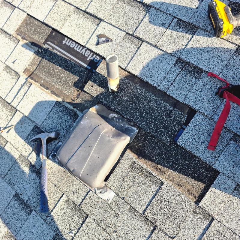 Roof pipe boot replacement with new flashing and shingles