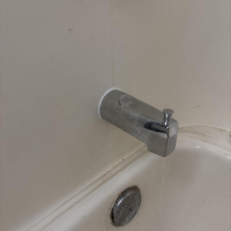 Chrome tub diverter spout with drywall patch hole Chrome tub diverter spout with drywall patch hole