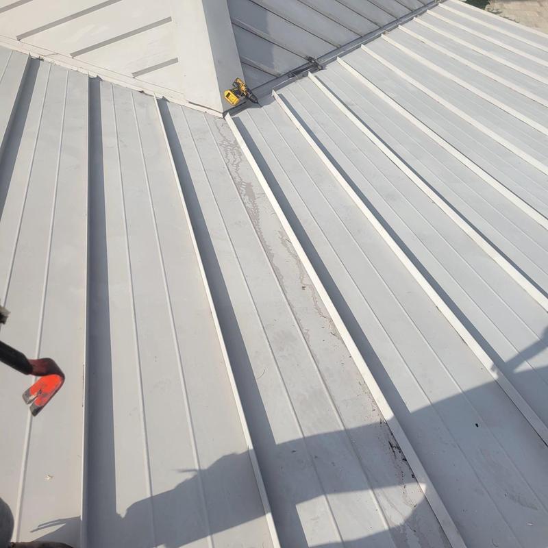 Standing seam metal roof panel replacement