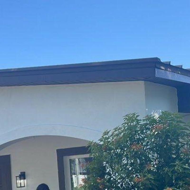 Aluminum standing seam roof with new fascia and soffit