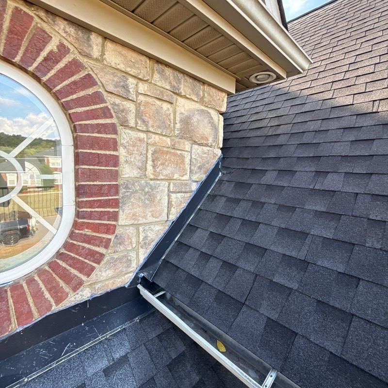 Roof flashing and shingle system near window trim