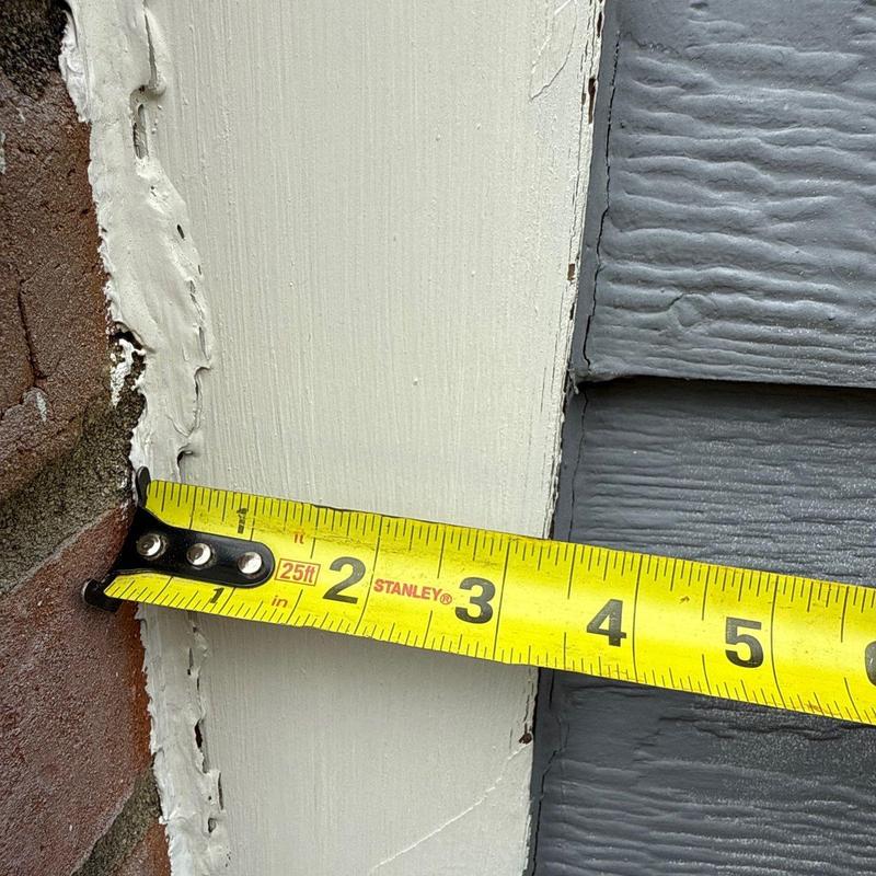 Exterior trim measurement near brick and siding panel