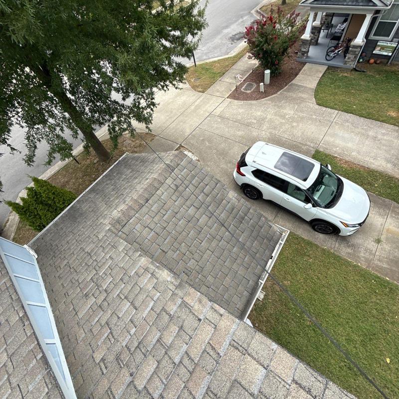 Asphalt shingle roof hail damage inspection overhead view
