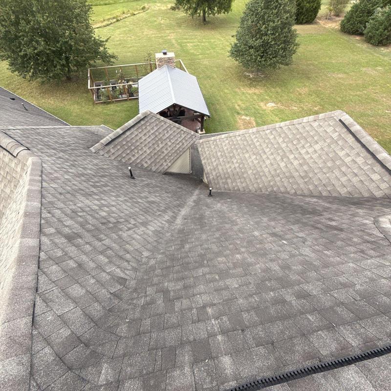 Asphalt shingle roof with hail damage inspection