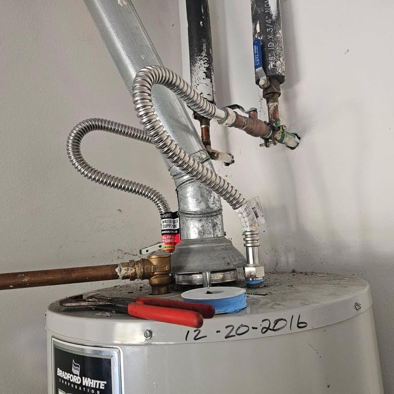 Water heater flexible connectors with new stainless steel hoses