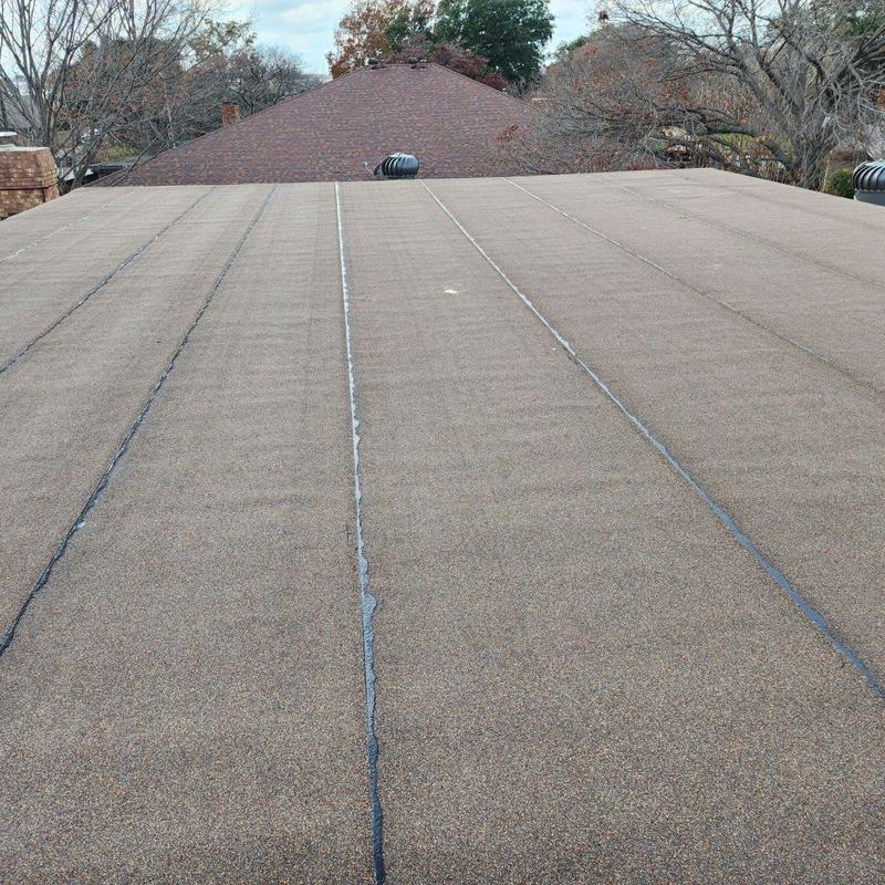 Modified bitumen flat roof with sealed seams