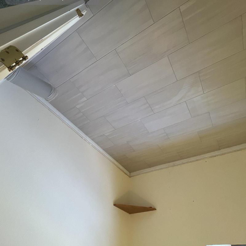 12x24 tile ceiling installation in room corner