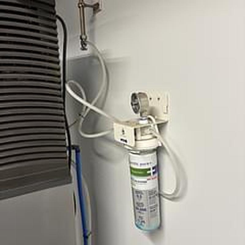 Ice machine water filter installation in commercial setting