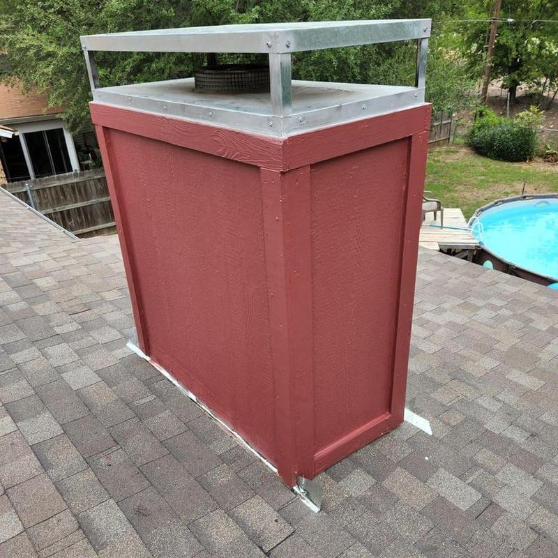 Chimney flashing and siding repair on shingle roof