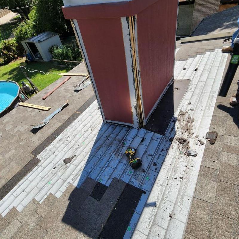 Chimney flashing removal and roof prep with tools