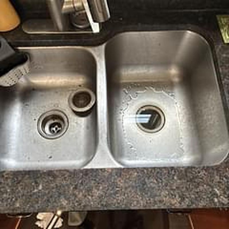 Kitchen sink drain with faucet and countertop
