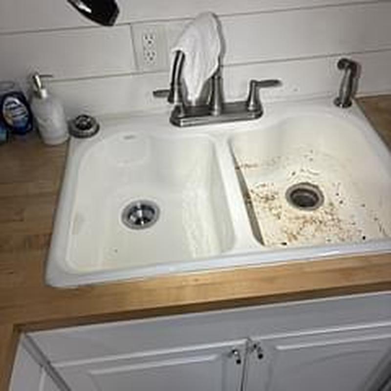 Garbage disposer drain in double kitchen sink