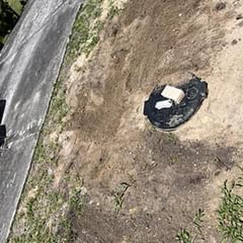 PVC laundry drain line excavation and repair in yard