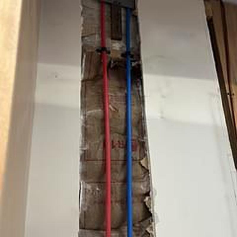 Pex A water supply lines installed inside wall cavity