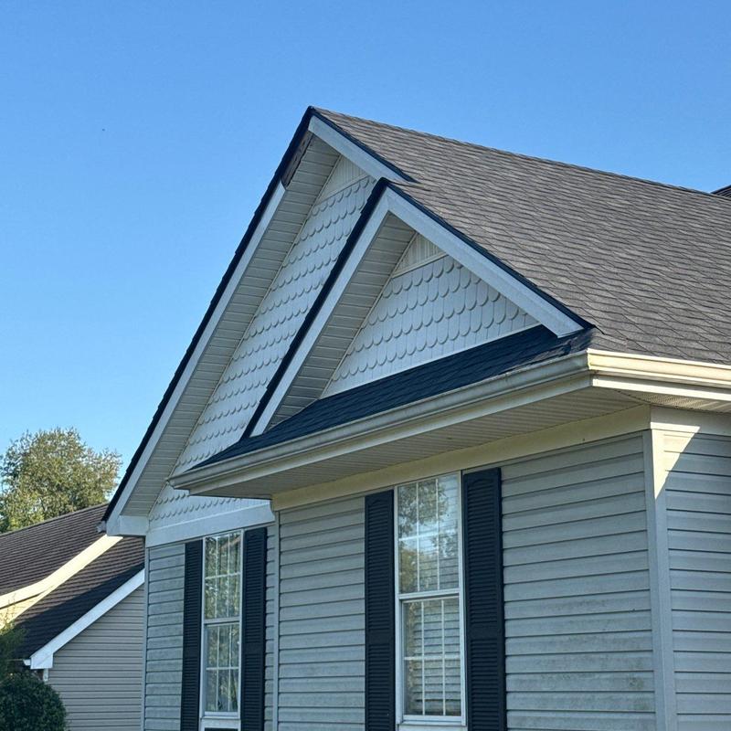 Asphalt shingle roof with hail damage inspection