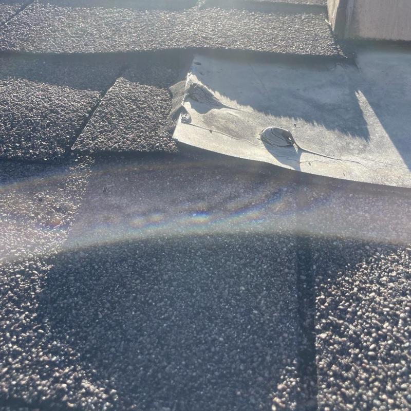 Plumbing vent boot with deteriorated seal on roof