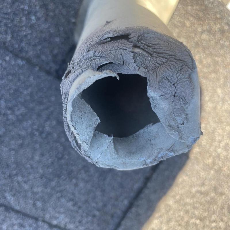 Plumbing vent boot with severe deterioration on roof