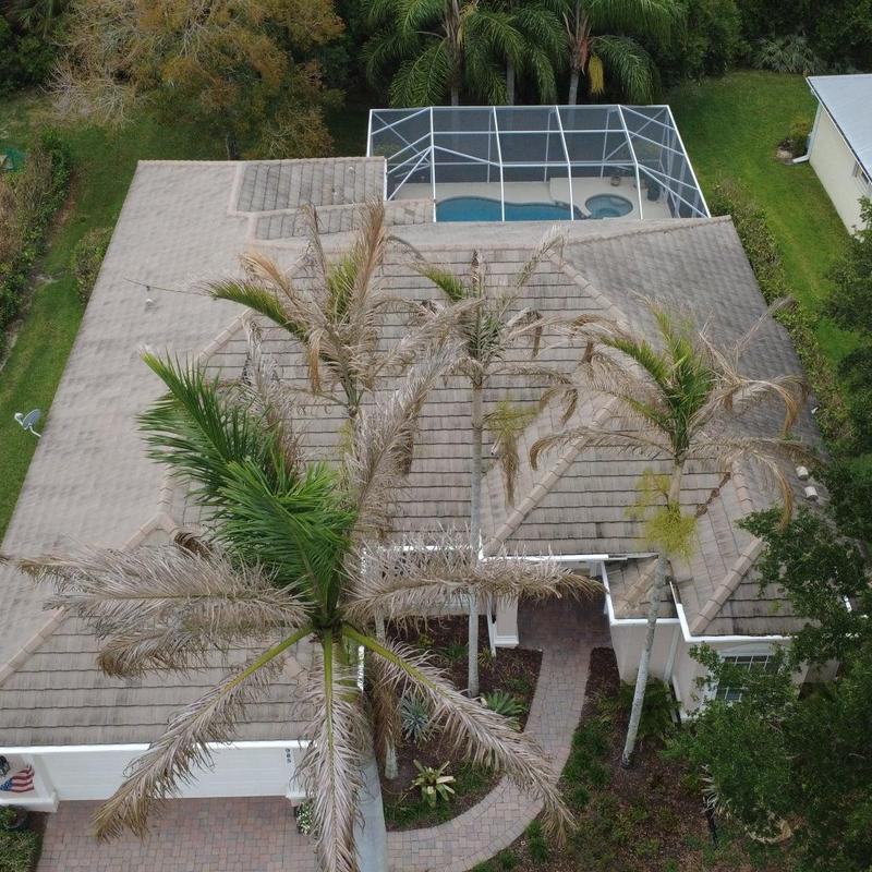 Clay tile roof drone inspection with pool enclosure