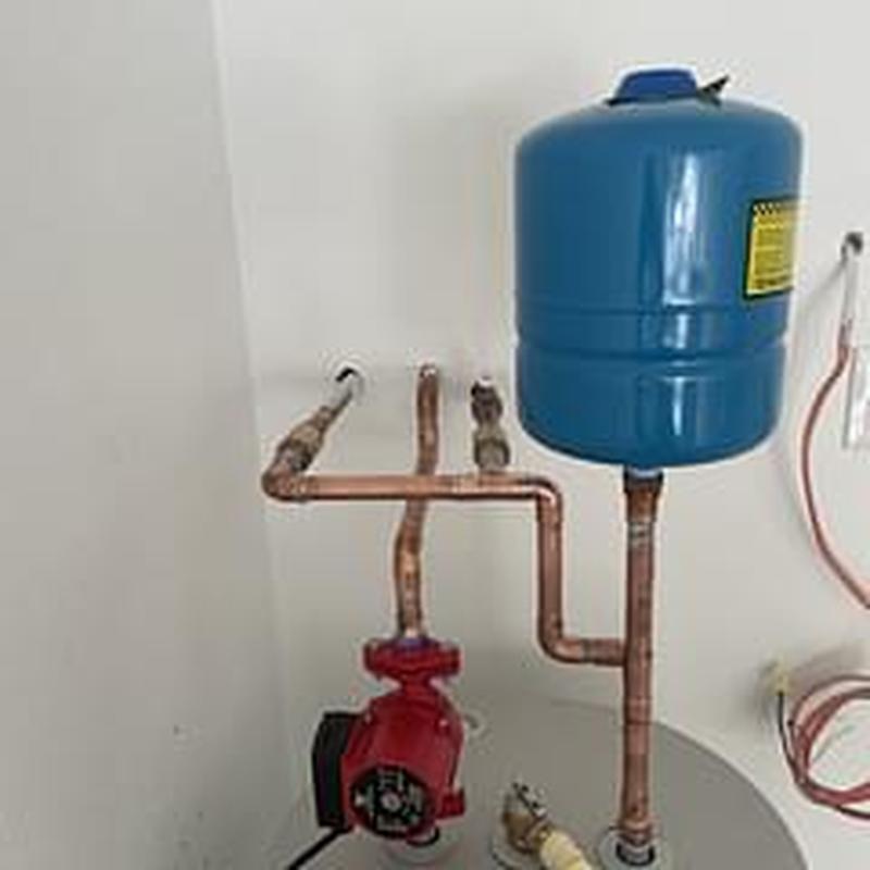 Expansion tank and pump with copper piping installation
