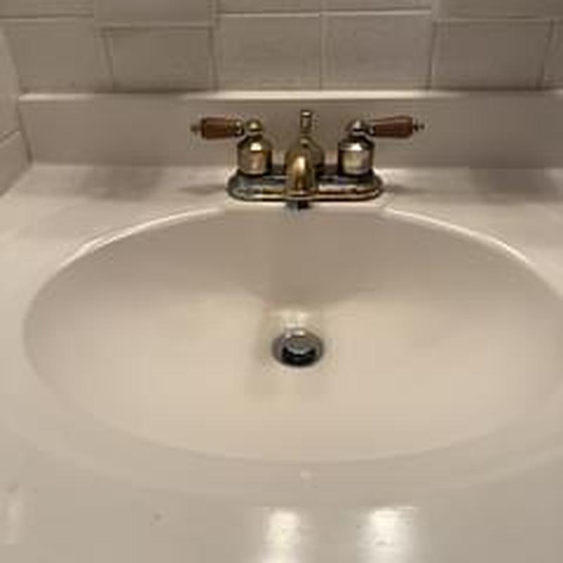Guest powder bath faucet with dual handles installed