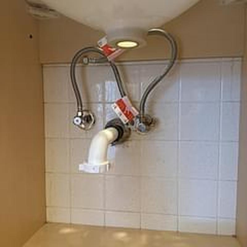 Vanity drain and supply lines installed under sink
