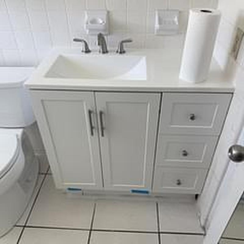 Bathroom vanity with faucet and sink installation