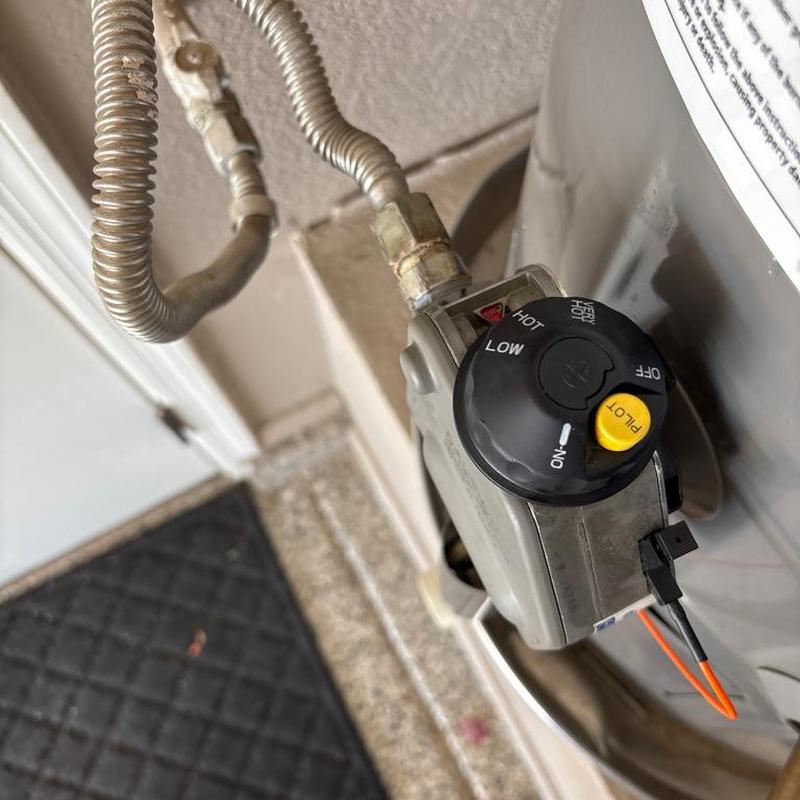 Water heater gas control valve with pilot button